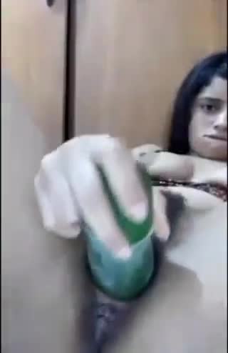 Little girl having fun with a giant, hallucinating cucumber!