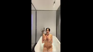Preview of Isadora Rockenback, naked, taking a beating of rubber stick in the face