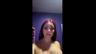 Preview of XEHLI G on Tiktok showing the body, with the breasts and the bottom show on the bed
